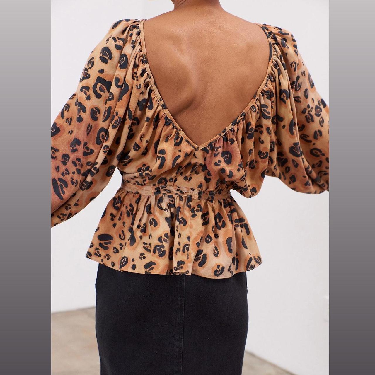 Mara Hoffman’s animal print top Size: S | US 4